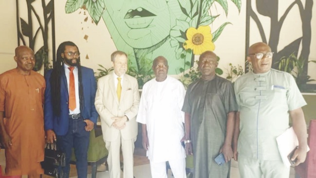 Manuel Innocencio (3rd left) flanked by members of BAA