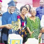 Marbel Seun flanked by family and friends