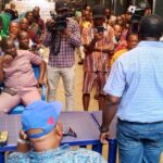NAFDAC official addressing the traders