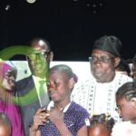Obasanjo with beneficiaries of the free hearing aids