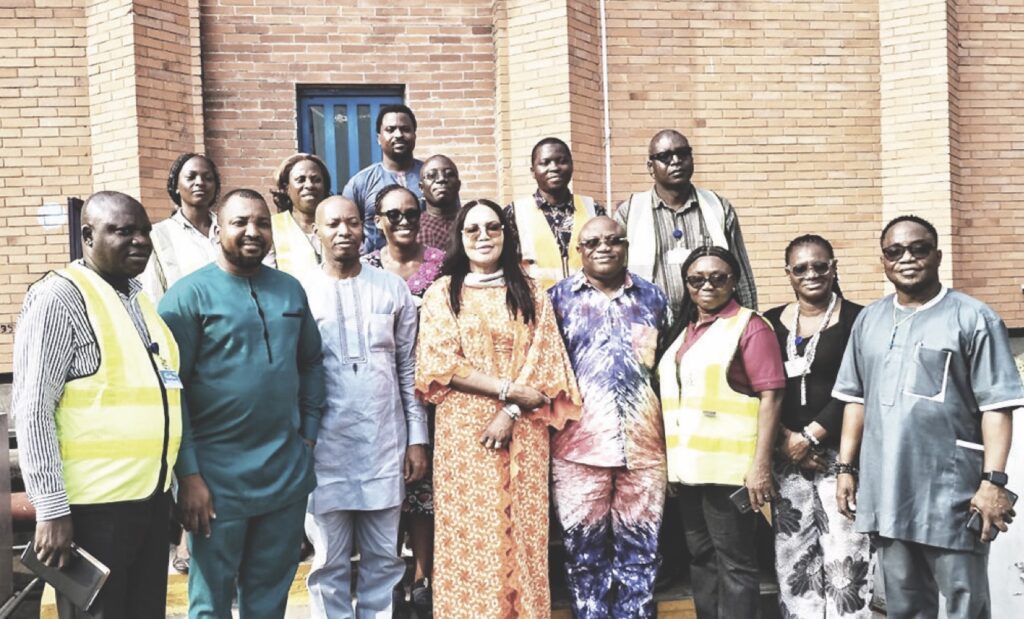 Onyejiocha with her entourage and staff of the company
