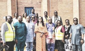 Onyejiocha with her entourage and staff of the company