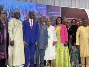 Chairman of the Presidential Fiscal Policy and Tax Reforms Committee, Taiwo Oyedele (middle) flanked by Vice President of NIPR, Emmanuel Dandaura (left), President of NIPR, Ike Neliaku (right) and other members of the institute at day two of the Nigeria Spokespersons Summit (NSS), organised by Nigerian Institute of Public Relations (NIPR), Wednesday 16, April 2025 in Abuja