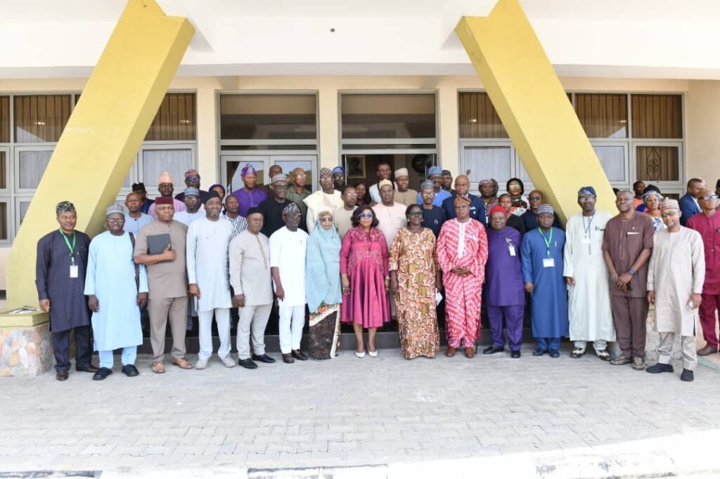 Head of the Civil Service of the Federation (HCSF), Didi Walson-Jack,  (M) in a group photograph with participants at the Opening Ceremony of the 12th Batch of the Mandatory Training Programme for Chief Executive Officers of Federal Government Parastatals and Agencies