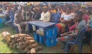 A cross session of the community people at the ceremony