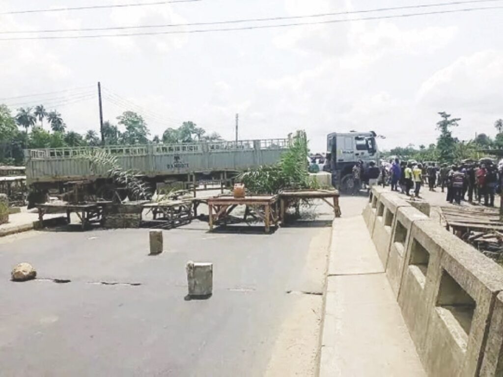Angry youths barraciding the road