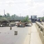 Angry youths barraciding the road