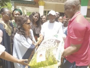 Ani (middle) presenting items to constituents