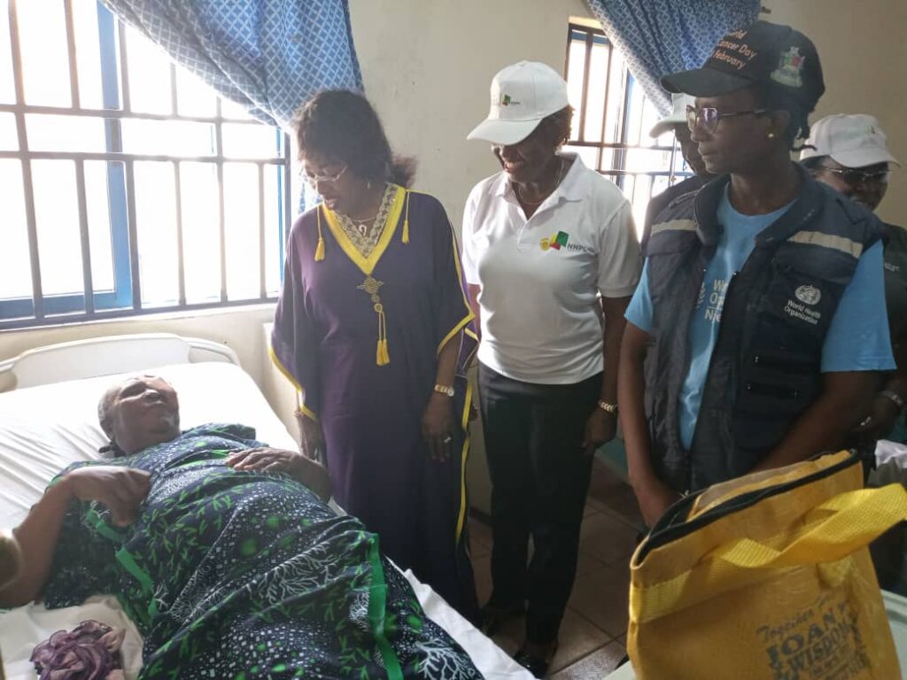 Dr Diri, NNPC Foundation officials with one of the beneficiaries