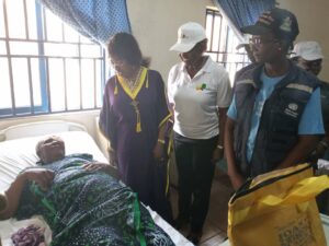 Dr Diri, NNPC Foundation officials with one of the beneficiaries
