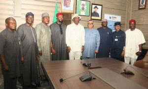 Minister of Aviation and Aerospace Development Festus Keyamo (middle)