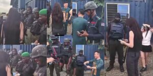 Police officers accepting money from Chinese national montage