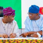 Lagos Governor Babajide Sanwo-Olu (R) and Deputy Governor Obafemi Hamzat (L)