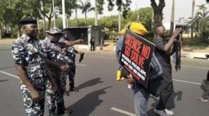 Police and protesters in Abuja