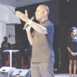 Pastor Ituah addressing the congregation