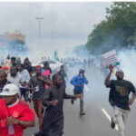 Police teargas protesters in Abuja