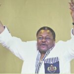 Triumphant Mike Adenuga