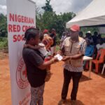 One of the beneficiaries of the empowerment programme carried out by the Nigerian Red Cross Society in Ikpe Community, Edo State