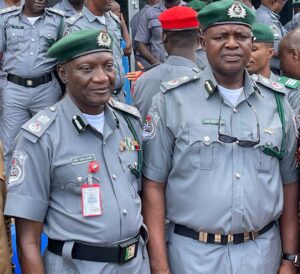 The immediate past Customs Area Controller of Ogun 1 Area Command, Idiroko, Mohammed Shuaibu (L) and the new Area Controller, Godwin Otunla, shortly after the change of baton of leadership