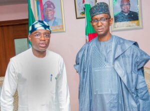 Benue State Governor Hyacinth Alia (L) and National Security Adviser Nuhu Ribadu (R)