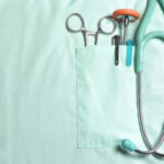 Doctors pockets with medical instruments.