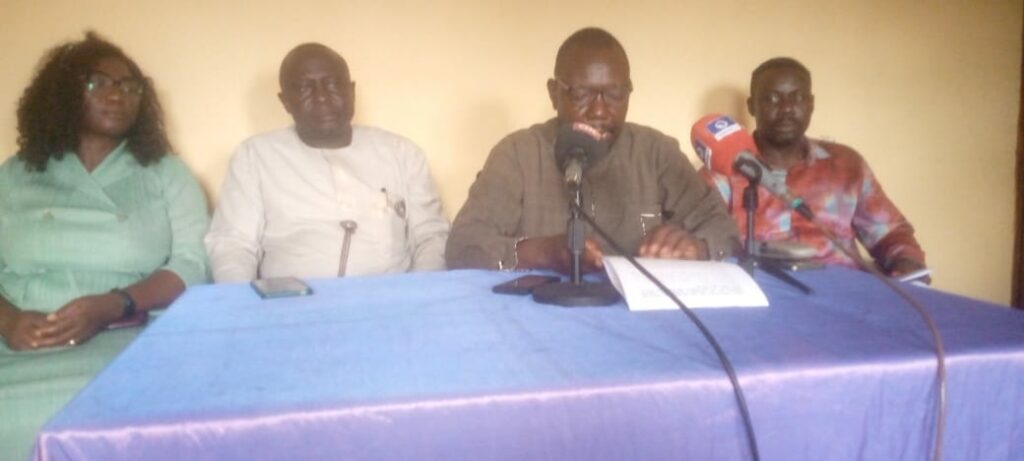 Dr Suleiman Chiroma (middle)  addressing a press conference in Uyo