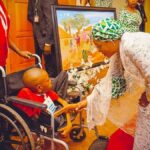 First Lady of Nigeria, Oluremi Tinubu with a young artist, Awelewa Eniola (a special needs child) after presenting her with his painting at the Launch of the special Adolescent Girls Initiative for Learning & Development, AGILE Additional Financing to States and AGILE Games Award Ceremony held at the State House, Abuja on Tuesday, May 27, 2025