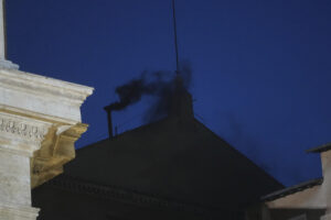 Black smoke billows from the chimney of the Sistine Chapel during the cardinals’ conclave to elect a new pope, at the Vatican, Wednesday, May 7, 2025. (AP Photo/Alessandra Tarantino)