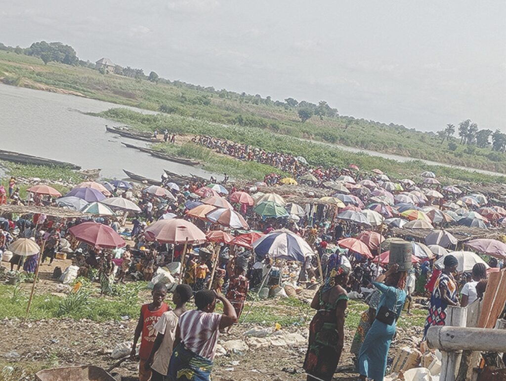Commercial activities at the banks of Omambala River, Eke Otuocha