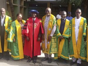 Dr. Raheem (3rd left), Dr. Abdul (3rd right) with management team of YABATECH