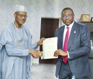Minister of Housing and Urban Development Architect Ahmed Dangiwa (L) and EFCC Executive Chairman Mr Olanipekun Olukoyede (R)