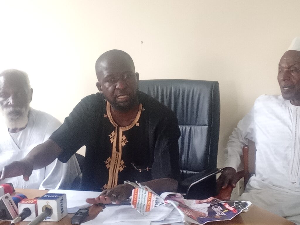 Mr. Emmanuel Bakam (middle)