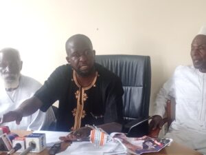 Mr. Emmanuel Bakam (middle)