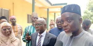 JAMB Registrar Professor Is-haq Oloyede (R)