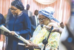 Peace Audu being sworn by the Chief Judge