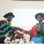 Prof. Joseph Onuoha, left, in a handshake with Prof Chike Ofoebe during the occasion