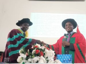 Prof. Joseph Onuoha, left, in a handshake with Prof Chike Ofoebe during the occasion