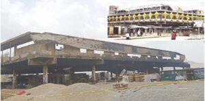 Remains of the market. Inset- The market before the fire incident