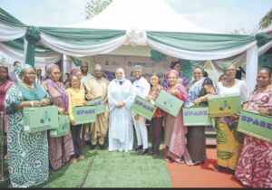 Sulieman-Ibrahim and Nwagba with some of the beneficiaries of the solar power system in Abuja