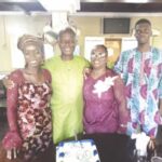 Tomy Okuyeme (2nd left) with family members at the event