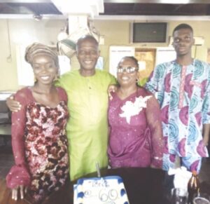 Tomy Okuyeme (2nd left) with family members at the event