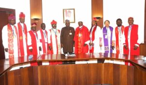 Secretary General Charismatic Bishops Conference of Nigeria (CBCN), Chivir Chianson; Special Adviser to the President on Public Communications and Media, Mr Daniel Bwala, and national deputy president (North) CBCN, Archbishop James Frances (middle), with others during a CBCN delegation visit on the Mr Daniel Bwala, at the Presidential Villa Abuja