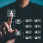 Organization chart, company leveling map, or organigram displayed with icons on a blue background. Business structure tree diagram showing human resources career path and employees’ hierarchy table.