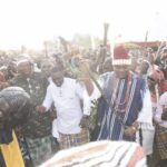 • Chief Ume (in red cap) receives Ekponibro masqeurade