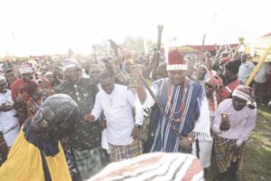 • Chief Ume (in red cap) receives Ekponibro masqeurade