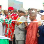 L-R: National Chairman of All Progressive Congress (APC), Abubakar Ganduje, Deputy Speaker of House of Representatives, Benjamin Kalu, Minister of FCT, Nyesome Wike and other dignitaries at the commissioning of the new Collector Road CN2, popularly known as Zakari A. Kiari Street, Abuja