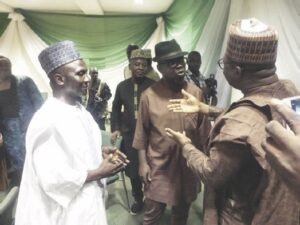 Dangut (left) with Oforji (middle) and members