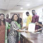 Mrs Umeha receiving her induction certificate