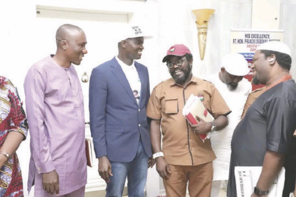 Nwifuru with some labour leaders when they paid him visit in his office