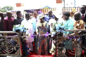 Rev. Nkwo (4th left), Rev. Ezekiel (cutting the tape), Rev. (Mrs.) Nkwo and others, during the dedication of the new worship centre
